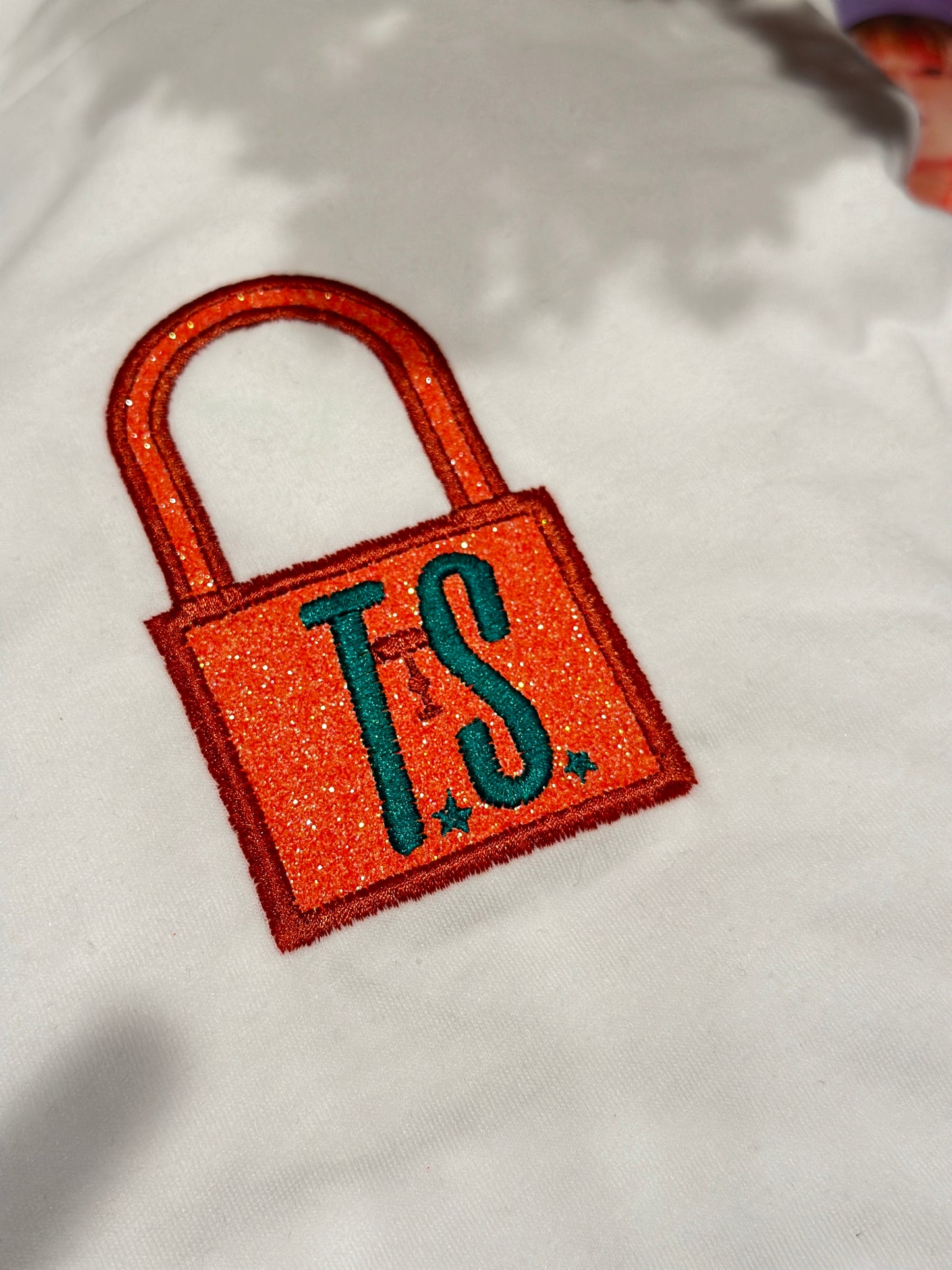 TS 12 inspired glitter lock shirt