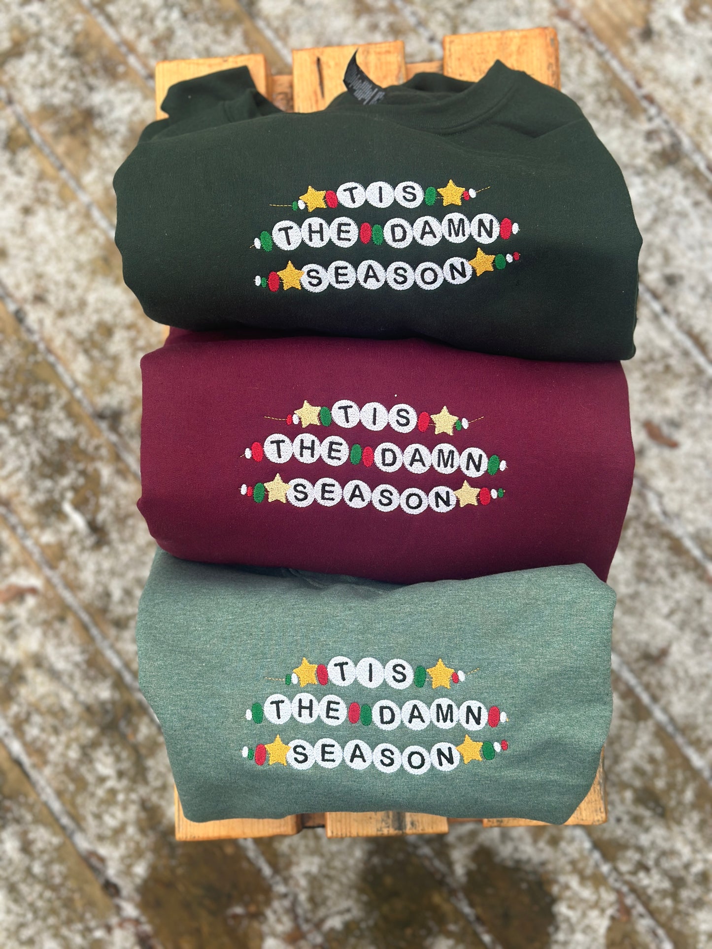 TS Tis the damn season Embroidered Friendship bracelet style crew neck sweatshirt